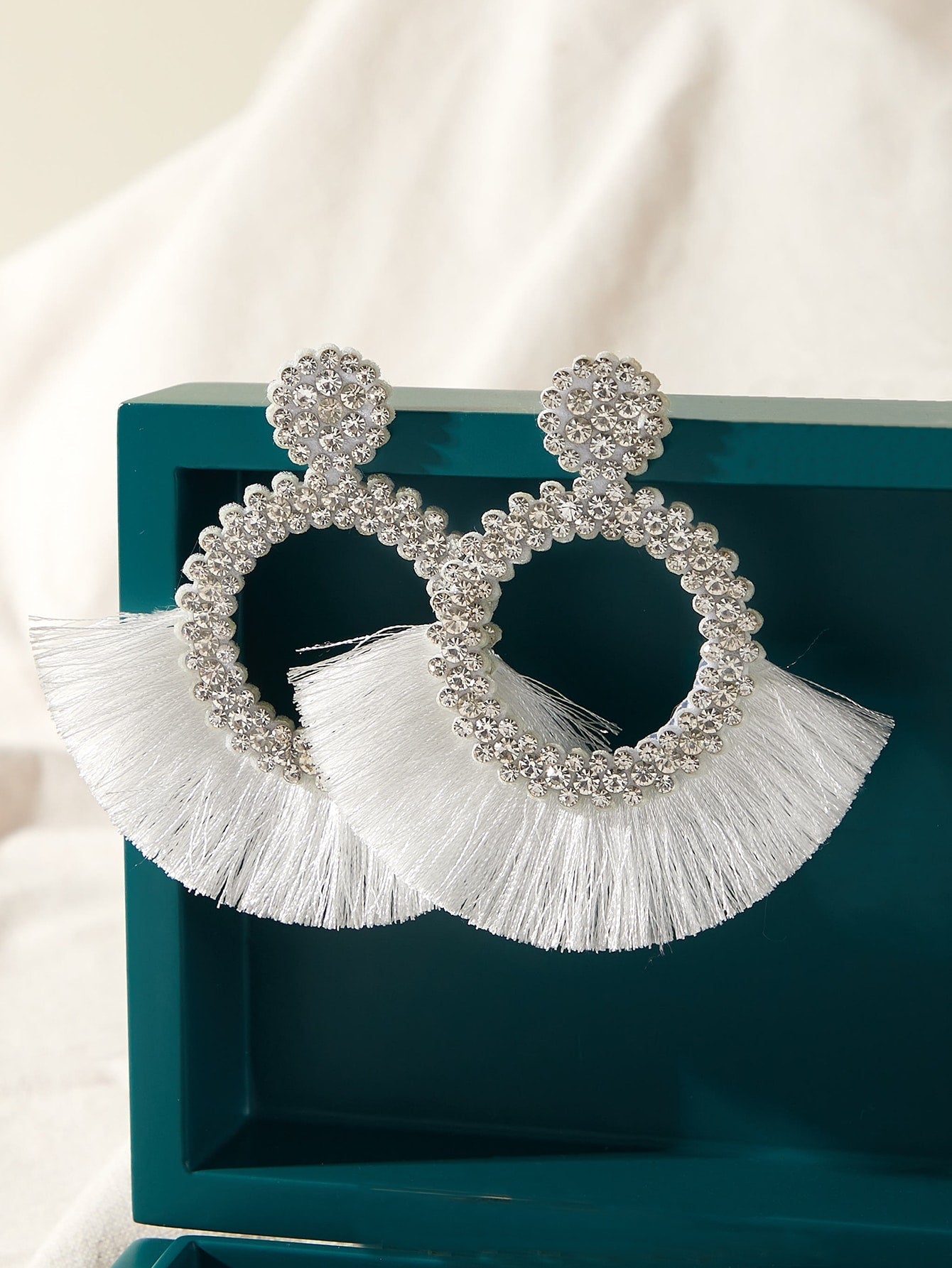 Drop earrings with artificial diamond engraving