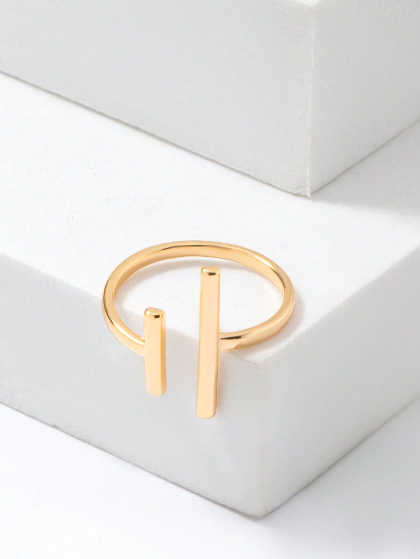 Open rectangular ring with decoration