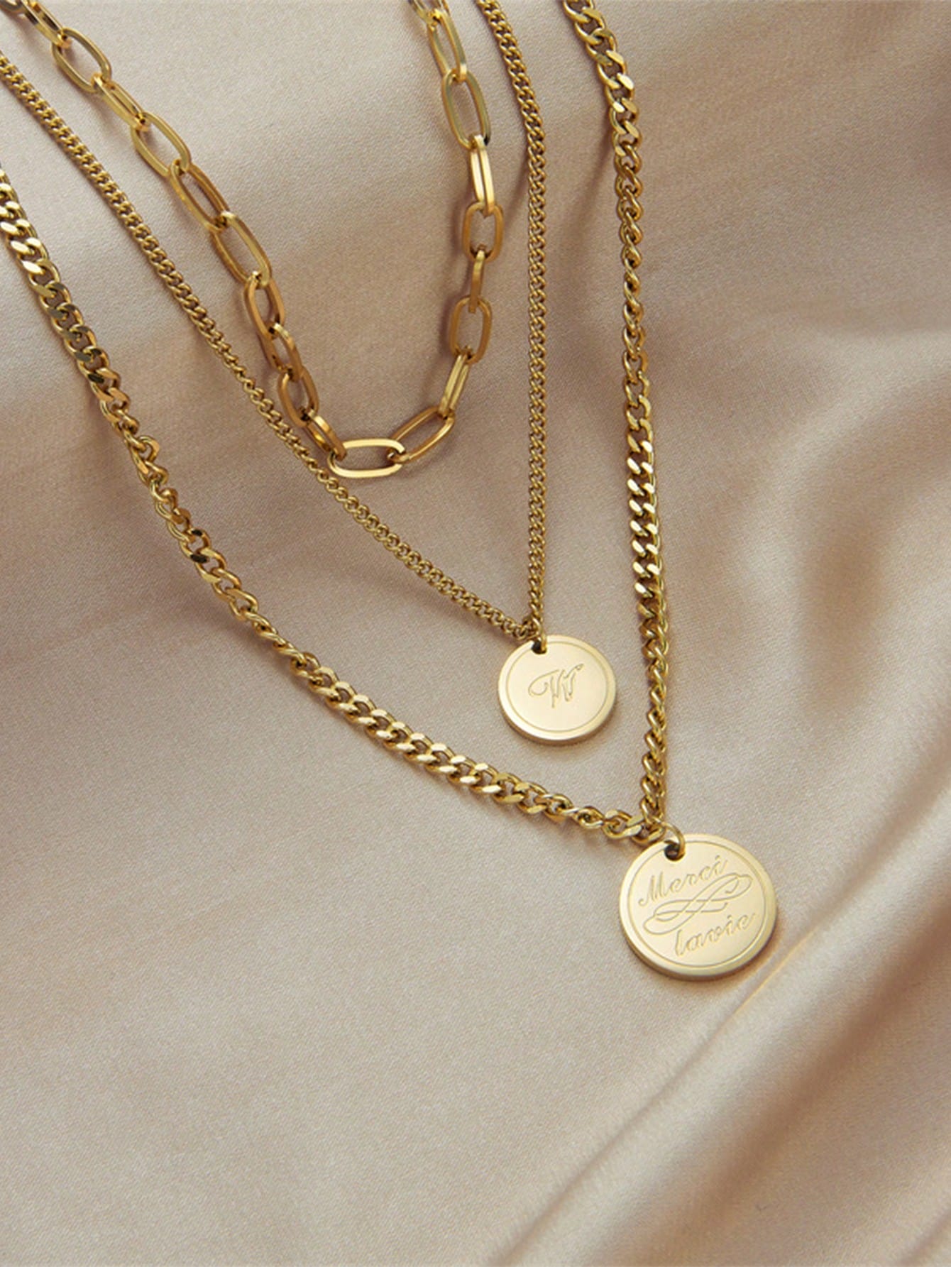 Stainless steel circle necklace with engraved simple multi-layer design and modern retro look, suitable for daily use