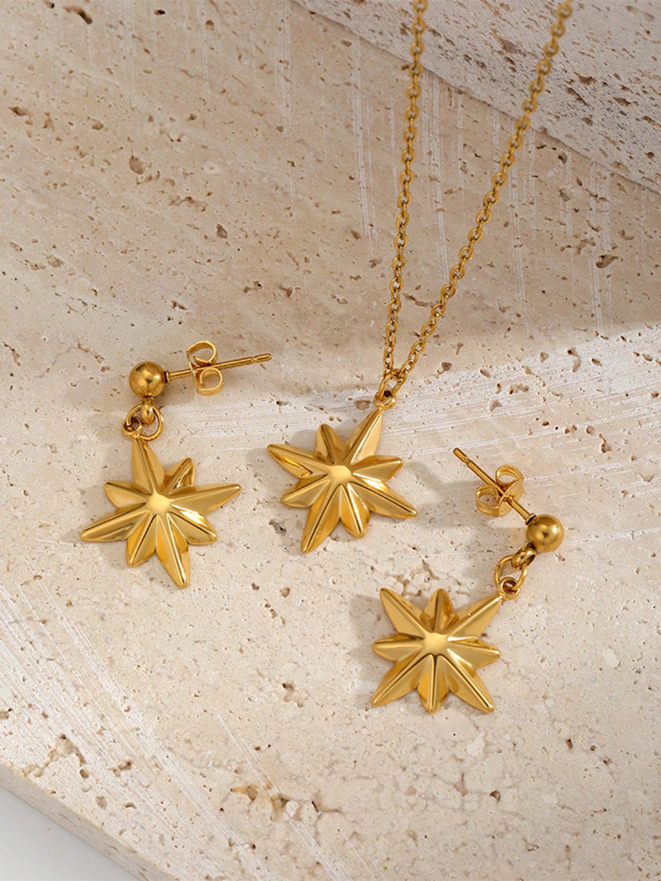 Complete necklace and earrings set made of stainless steel, waterproof and non-fading, in gold color, suitable for women's daily wear.