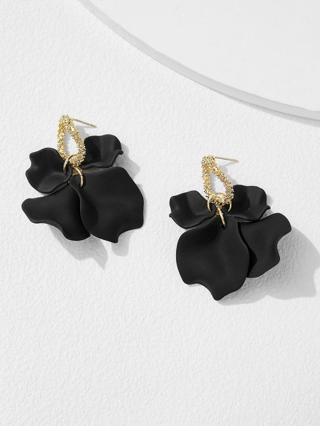 Black petal drop earrings