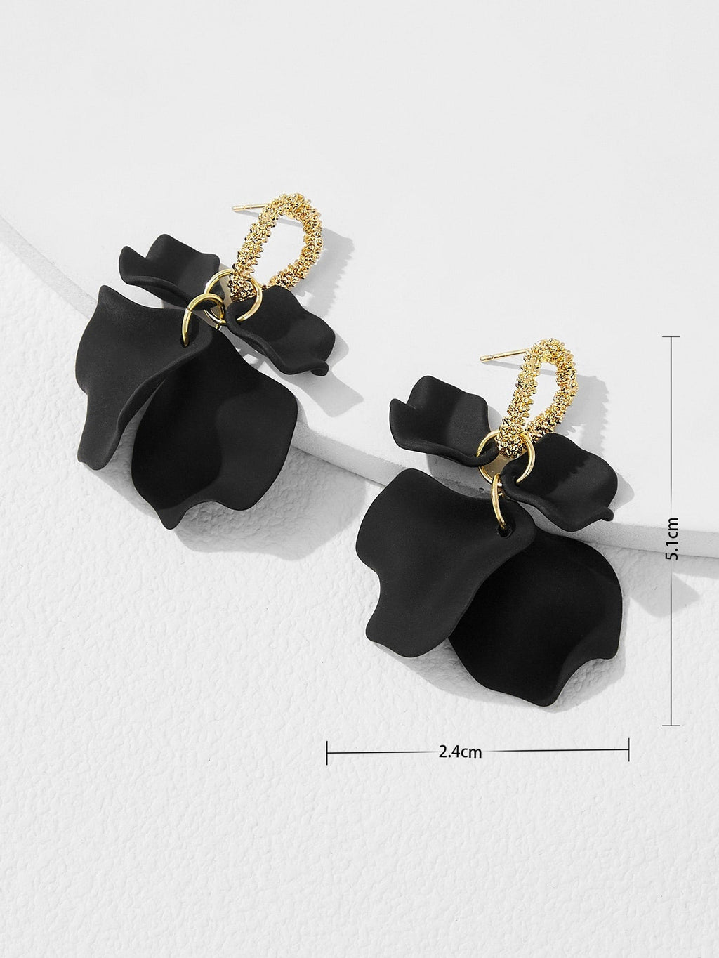 Black petal drop earrings