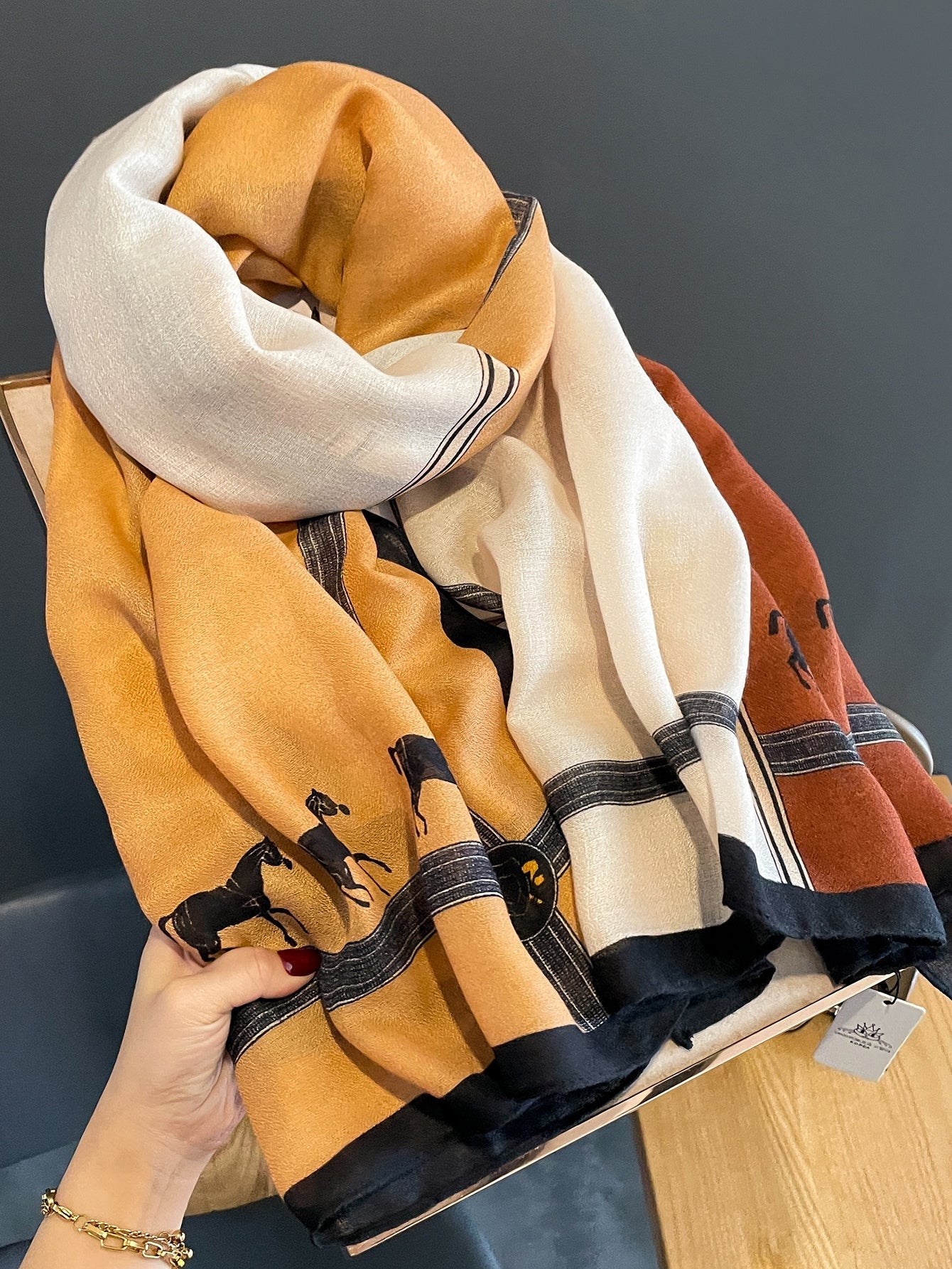 A striped scarf that looks stylish and casual for the weekend.