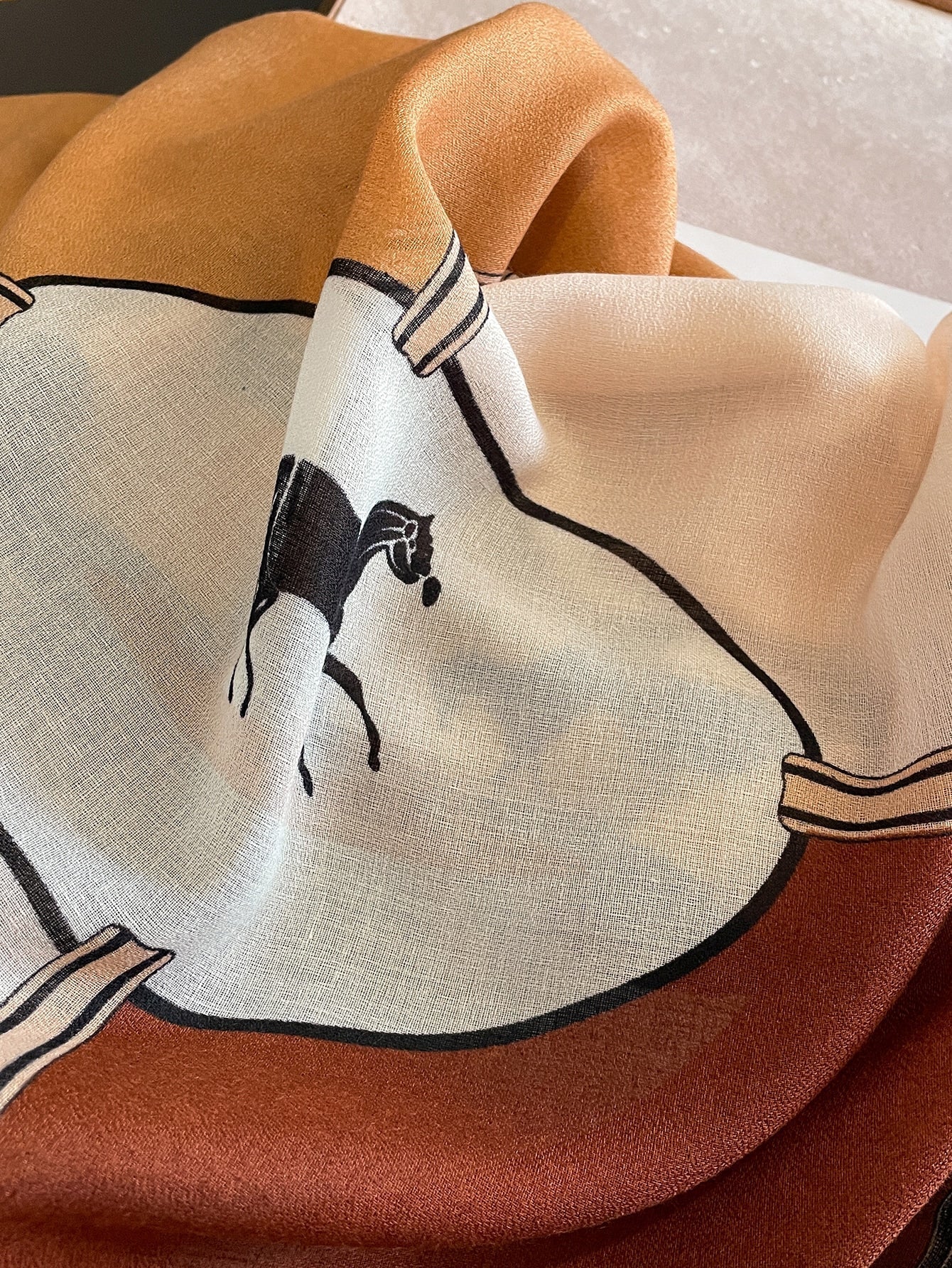 A striped scarf that looks stylish and casual for the weekend.