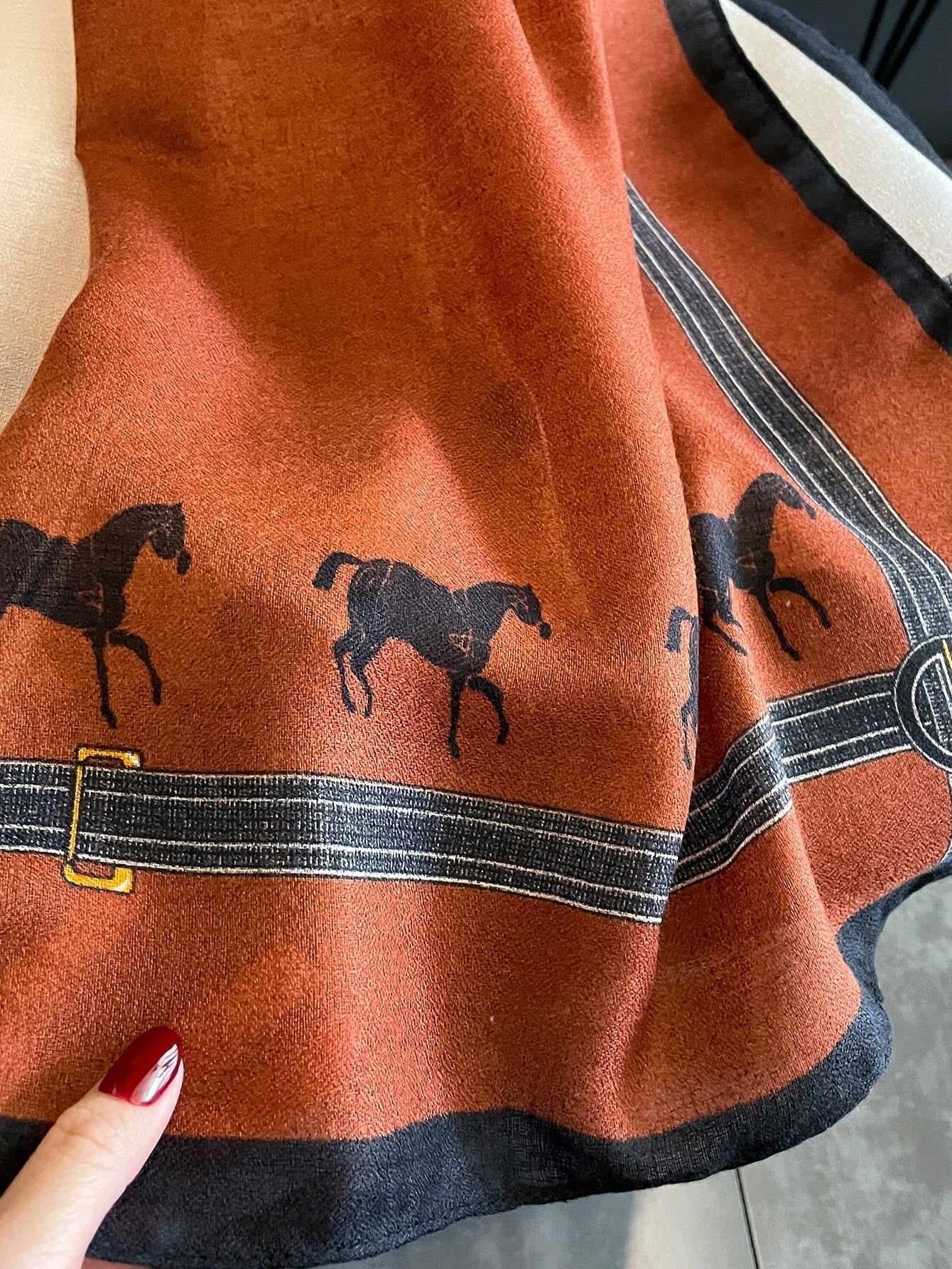 A striped scarf that looks stylish and casual for the weekend.