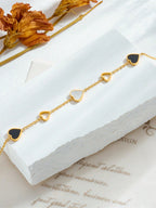 1 قطعة سوار من الفولاذ المقاوم للصدأ مصنوع من الفولاذ المقاوم للصدأ باللون الأسود وتصميم فراغ القلب للنساء بطراز جديد خفيف، مناسب للارتداء اليومي