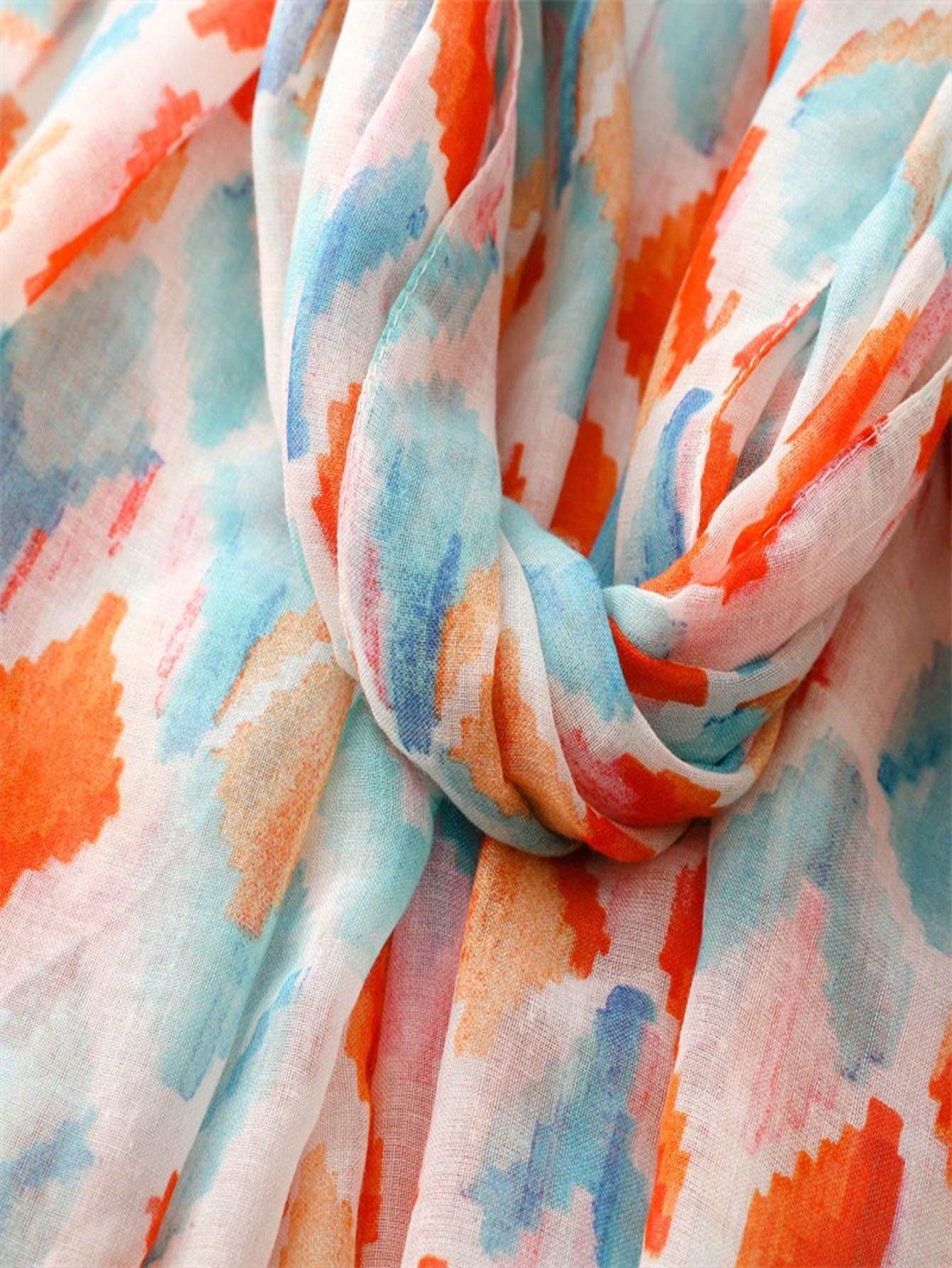 Stylish and colorful orange sunscreen scarf, perfect for spring and summer