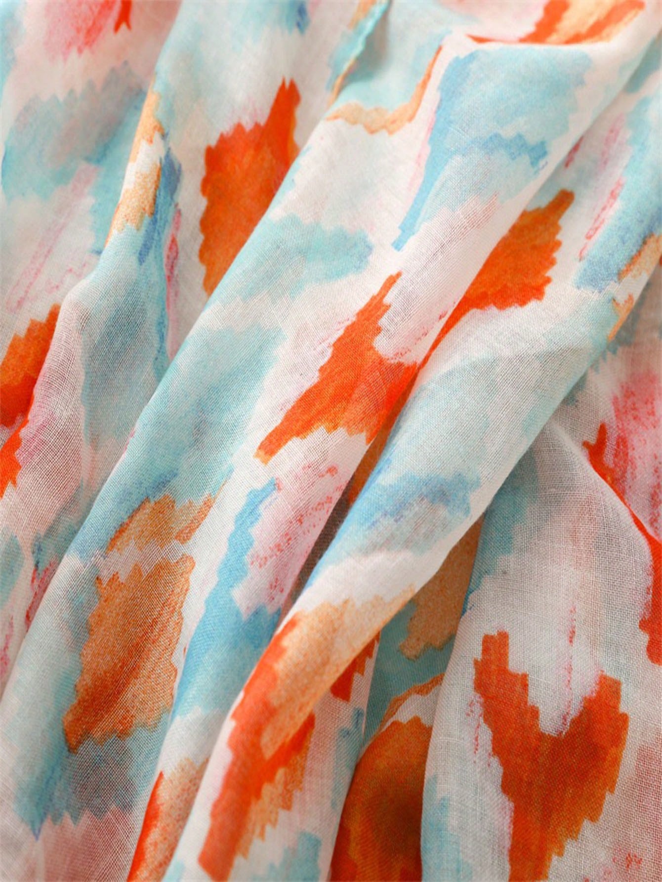 Stylish and colorful orange sunscreen scarf, perfect for spring and summer